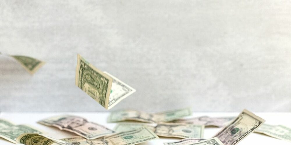 heal money blocks - lots of dollar bills