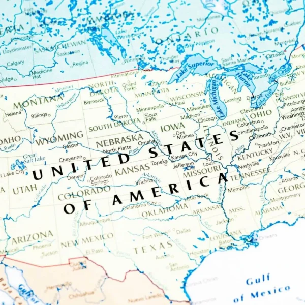 A detailed map of the United States of America highlighting states, major cities, and geographic features in pastel tones.