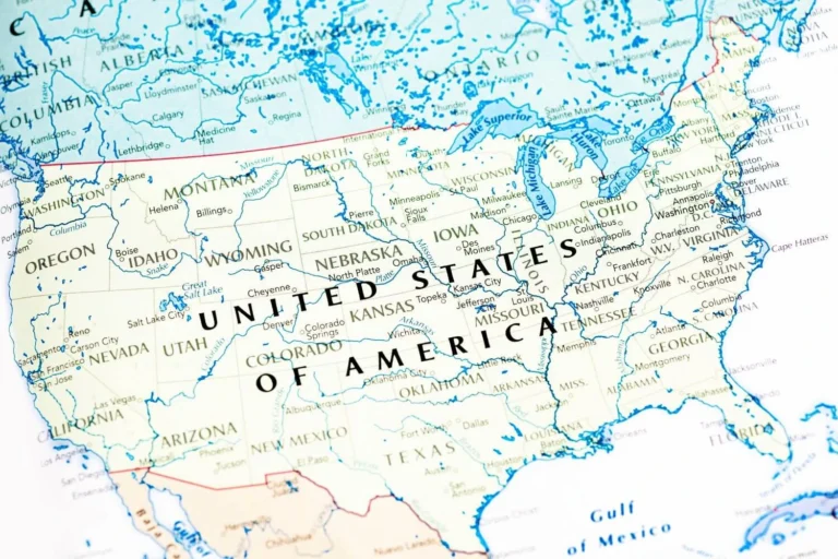 A detailed map of the United States of America highlighting states, major cities, and geographic features in pastel tones.
