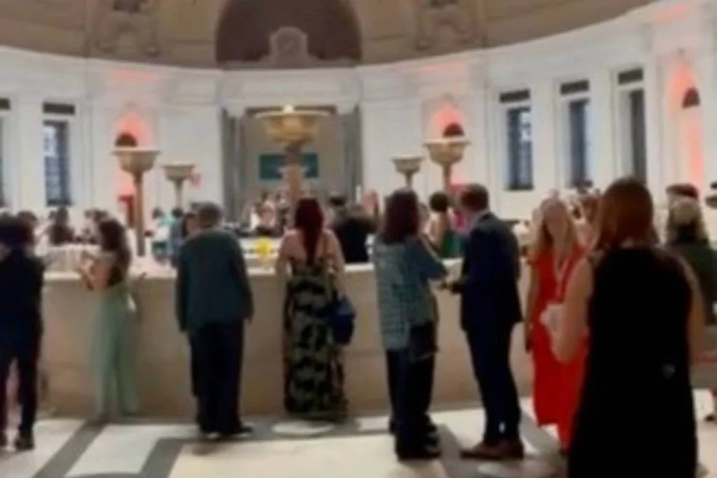 Elegant setting with women and allies socializing during a travel industry event, representing the growing role of inclusive travel leadership.