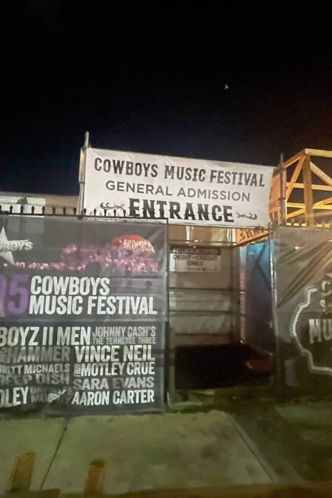 General admission entrance to Cowboys Music Festival in Calgary during Stampede at night.