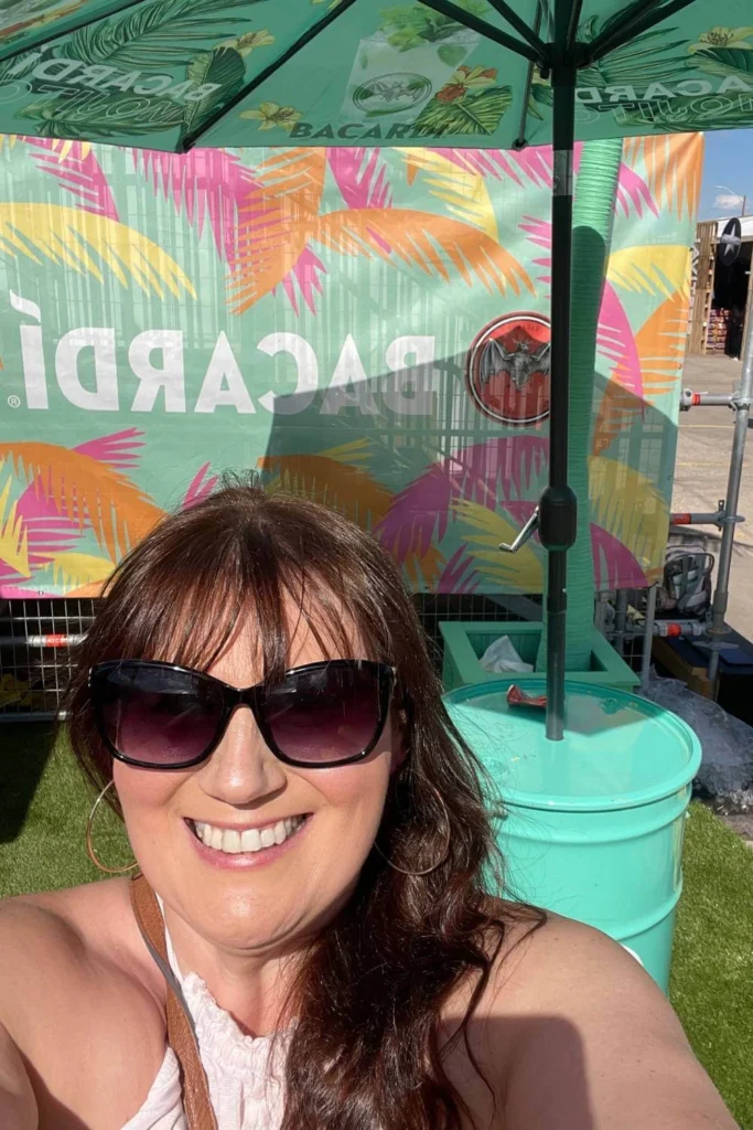 Solo female traveler, Gemma Lawrence, at the Bacardi lounge during Cowboys Music Festival in Calgary.