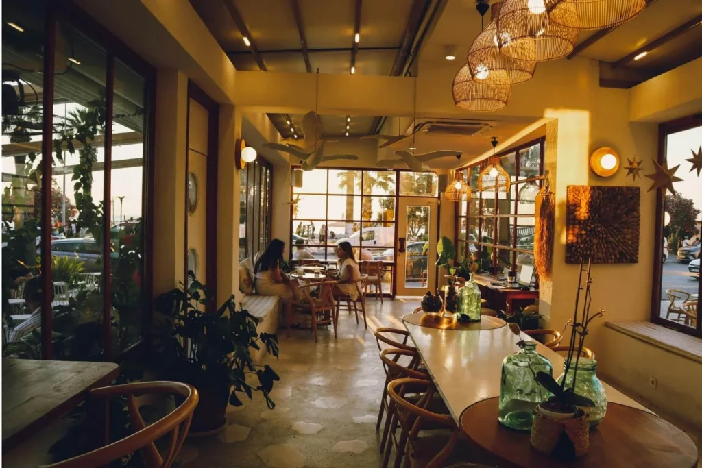 Warm and inviting café interior with soft lighting and cozy seating on a winter afternoon.