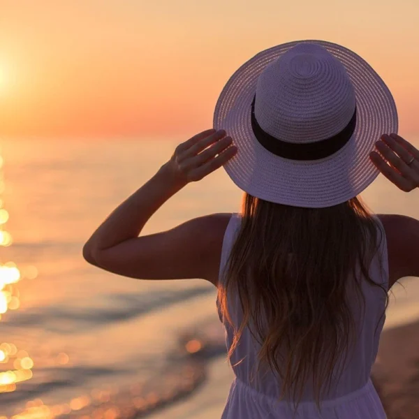 positive-travel-affirmations-solo-female-traveller-sunset-beach.