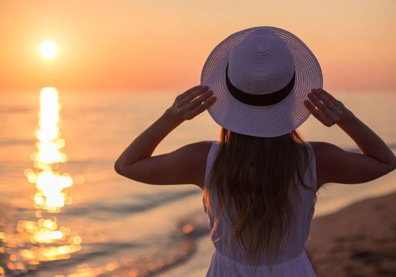 positive-travel-affirmations-solo-female-traveller-sunset-beach.