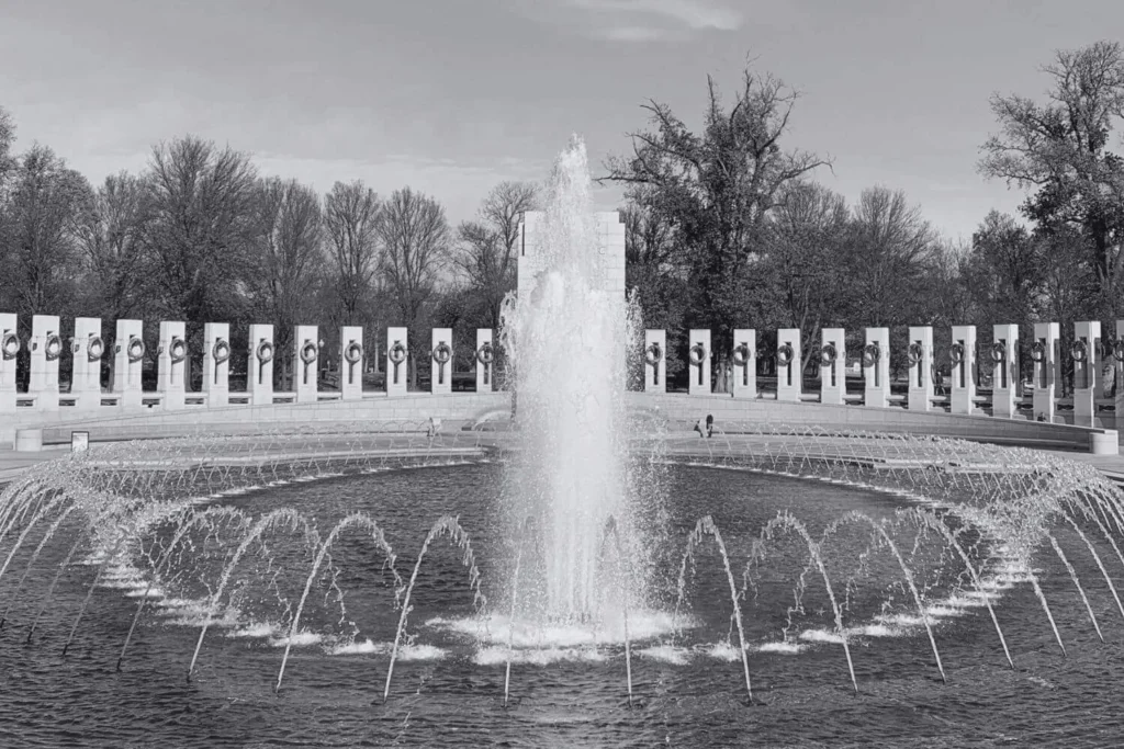 World War II Memorial in Washington DC with the central fountain and state pillars, symbolizing America’s antifascist history and the fight against authoritarianism.
