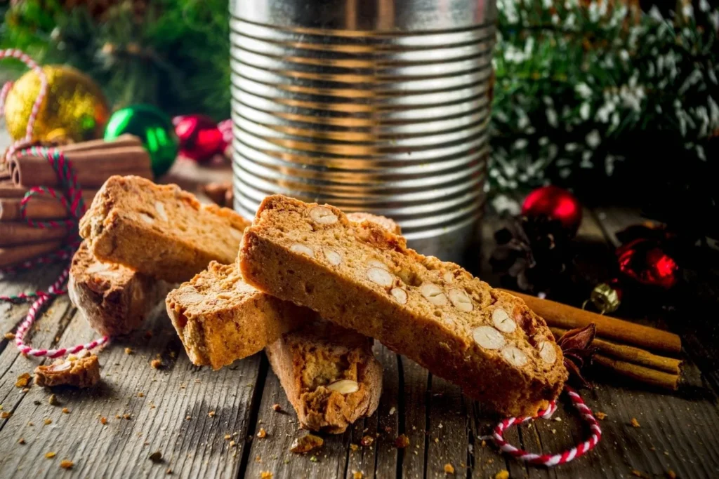 Crunchy almond biscotti served as a festive British Christmas snack with holiday decorations.