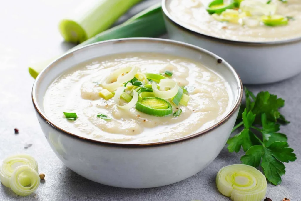 Classic British leek and potato soup served warm as a comforting winter dish.