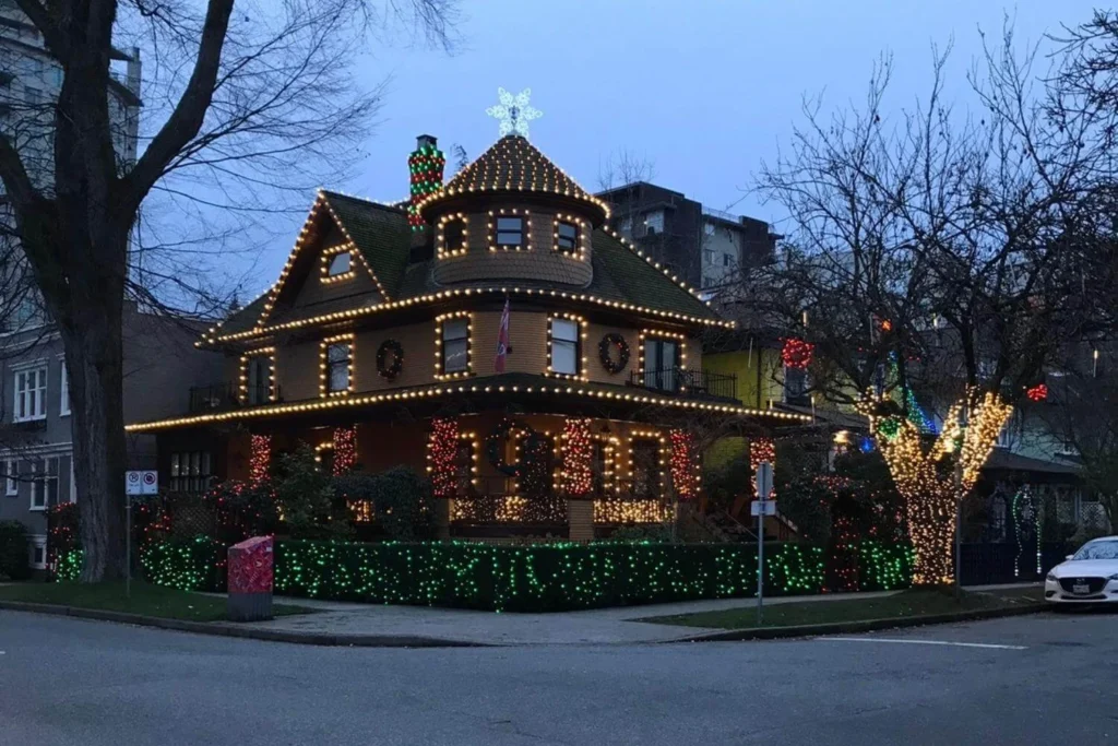 A residential house in Vancouver decorated with Christmas lights on Christmas Day, showing a cozy neighbourhood holiday atmosphere.