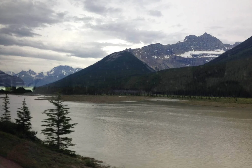Wide mountain and river valley landscape showing the scale and diversity of Canada’s natural scenery.