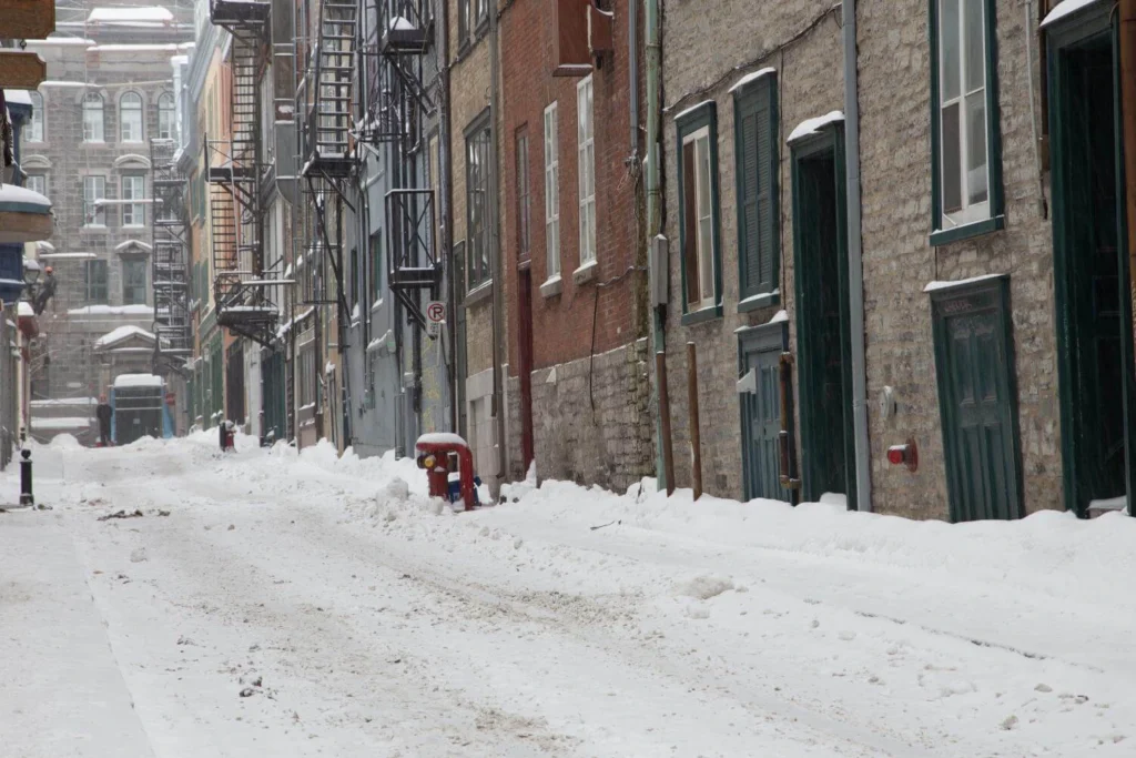 Snow-covered street in Quebec City showing what winter months look like in Canada.