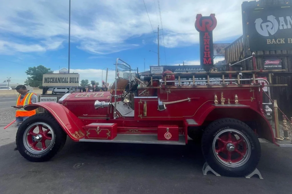 Vintage red fire truck on display in Calgary, reflecting the city’s history and Western culture.