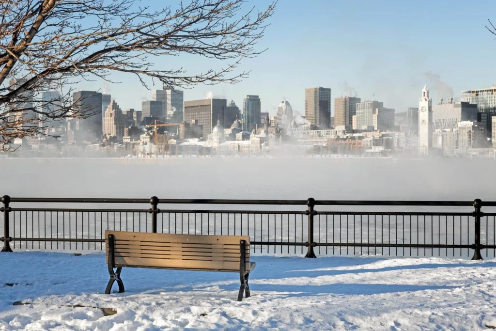 Montreal skyline in winter showing urban winter travel in Canada.